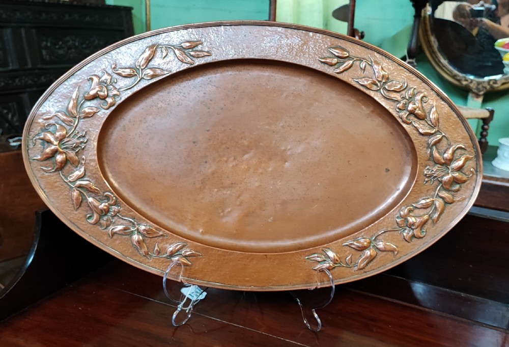 A beautiful arts and crafts oval copper tray.