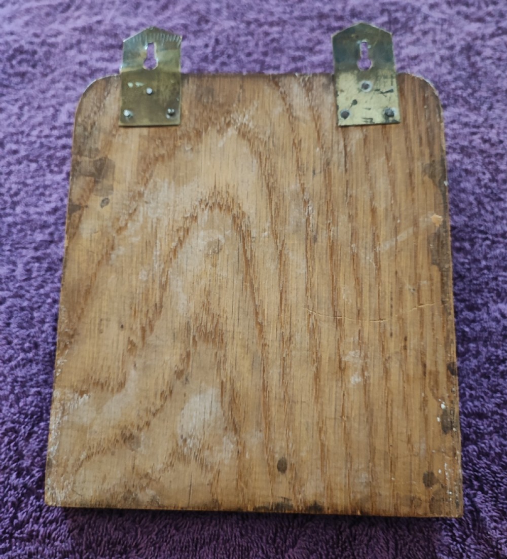 Art's and crafts oak and brass wall mounted letter rack. View III