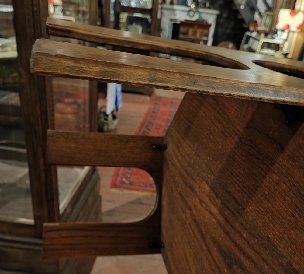 Liberty's of London oak art's and crafts occasional book table. View V