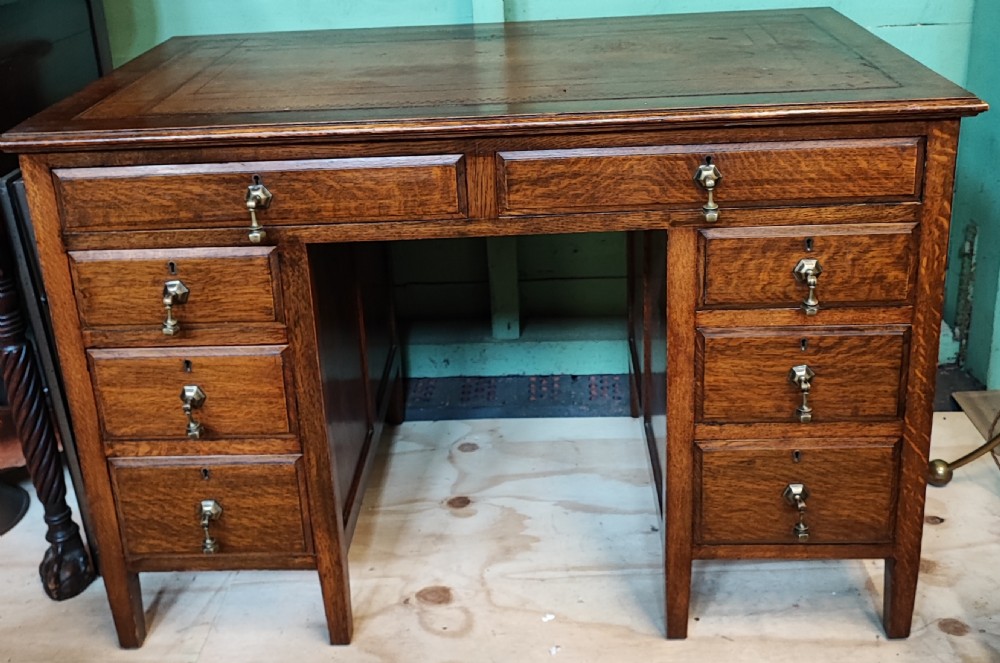 Antique Edwardian oak pedestal desk.