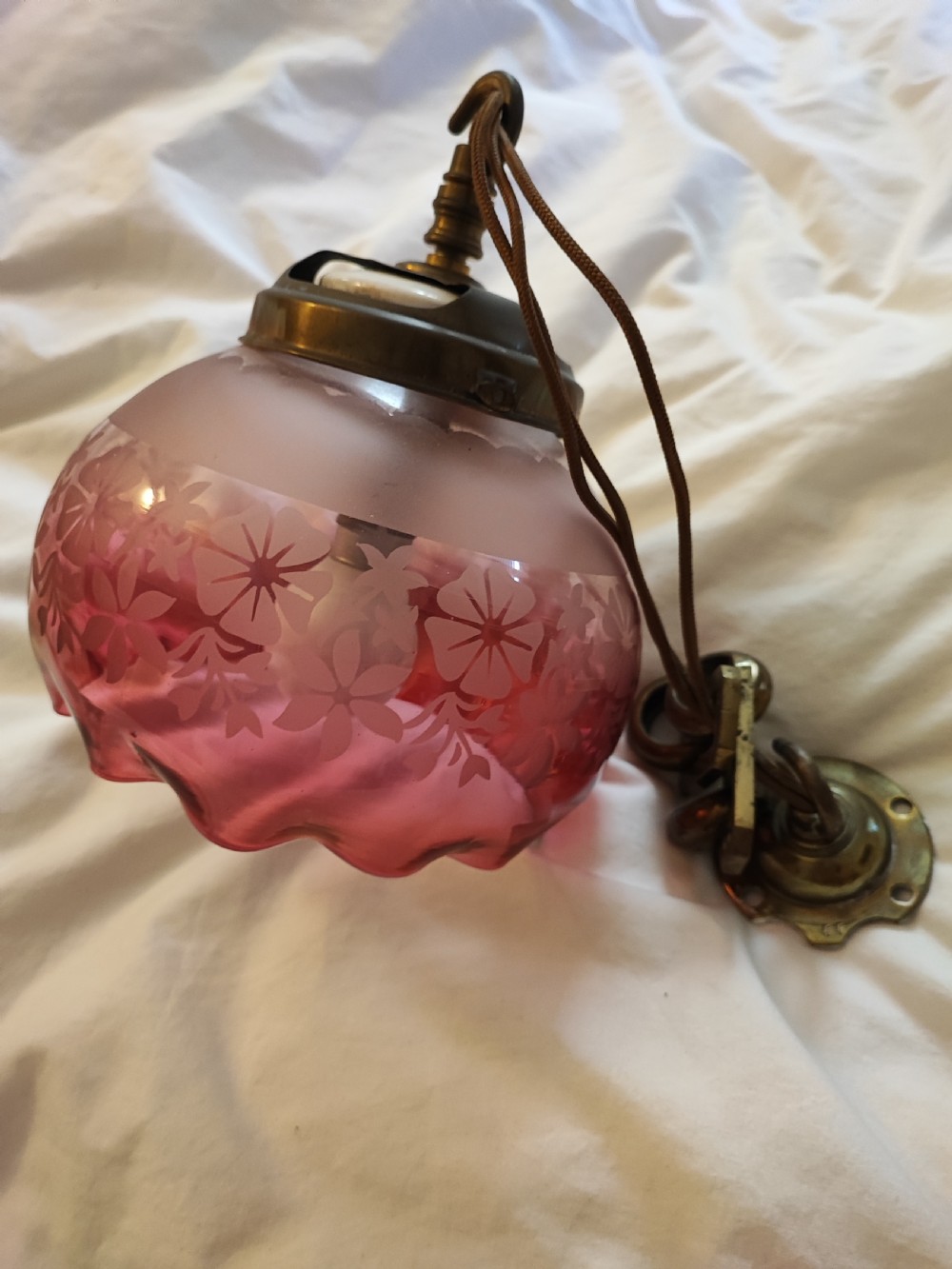 A very pretty Victorian cranberry hanging glass light fitting. View X