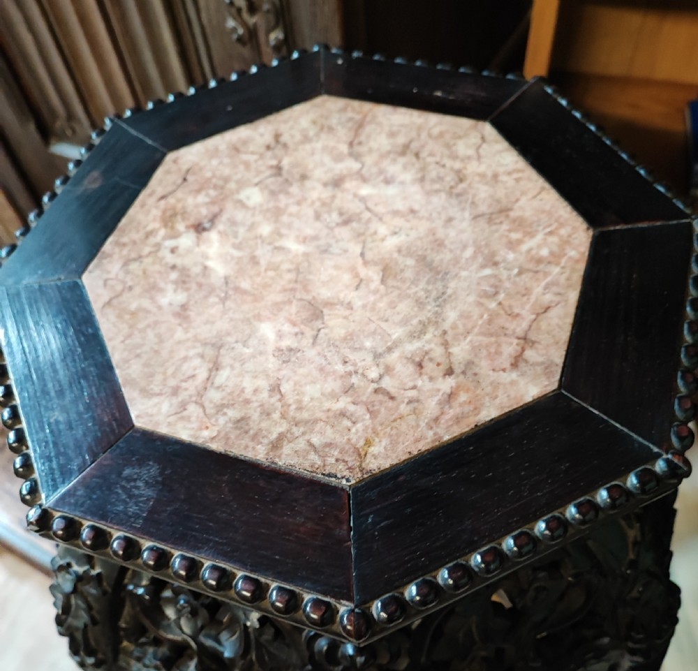 A 19c tall qing dynasty hardwood stand with rouge marble insert. View II