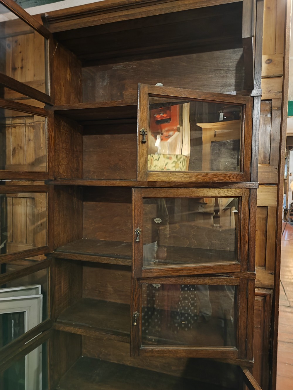 Antique oak stacking sectional bookcase by Simpoles of Manchester. View III