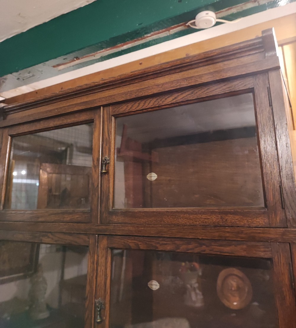 Antique oak stacking sectional bookcase by Simpoles of Manchester. View VI