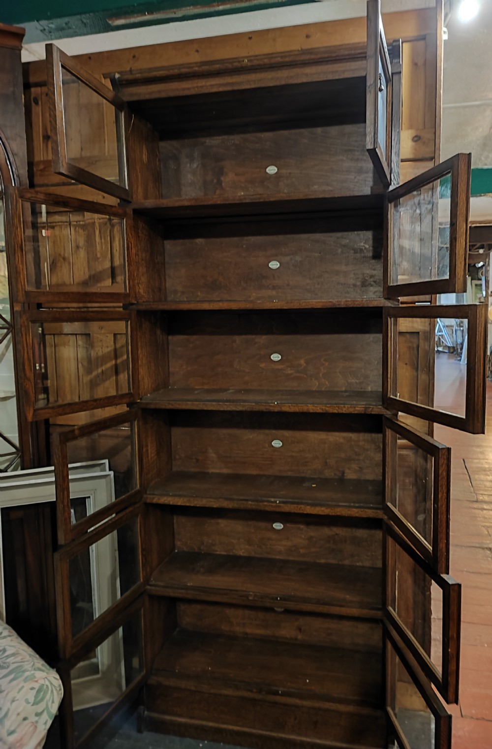 Antique oak stacking sectional bookcase by Simpoles of Manchester. View IX