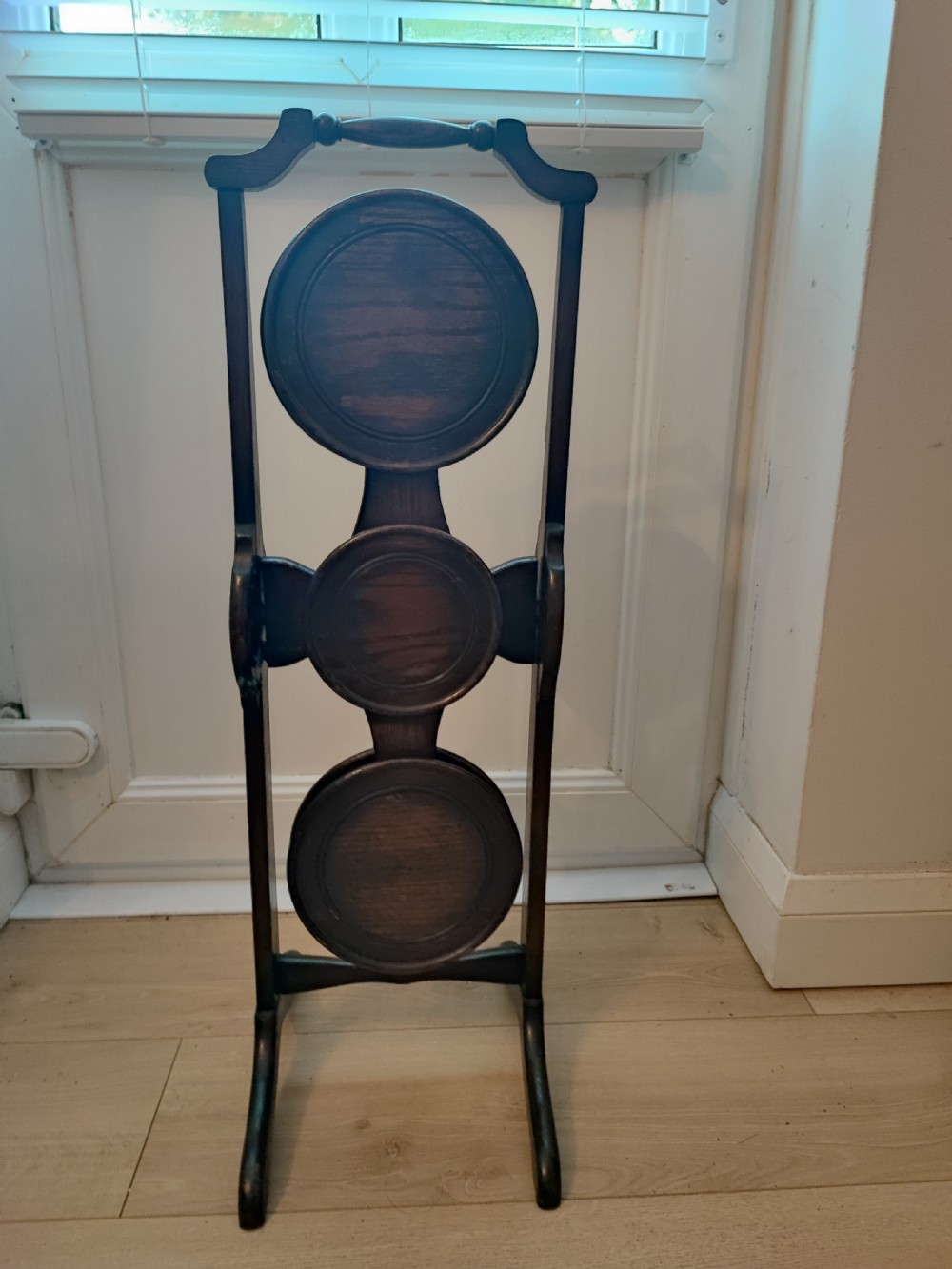 An antique oak  cake stand. View IX