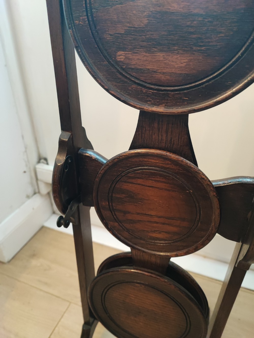 An antique oak  cake stand. View X