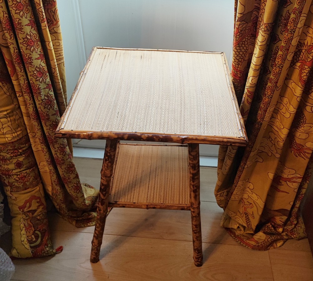 Victorian bamboo and rattan occasional table in the liberty style.