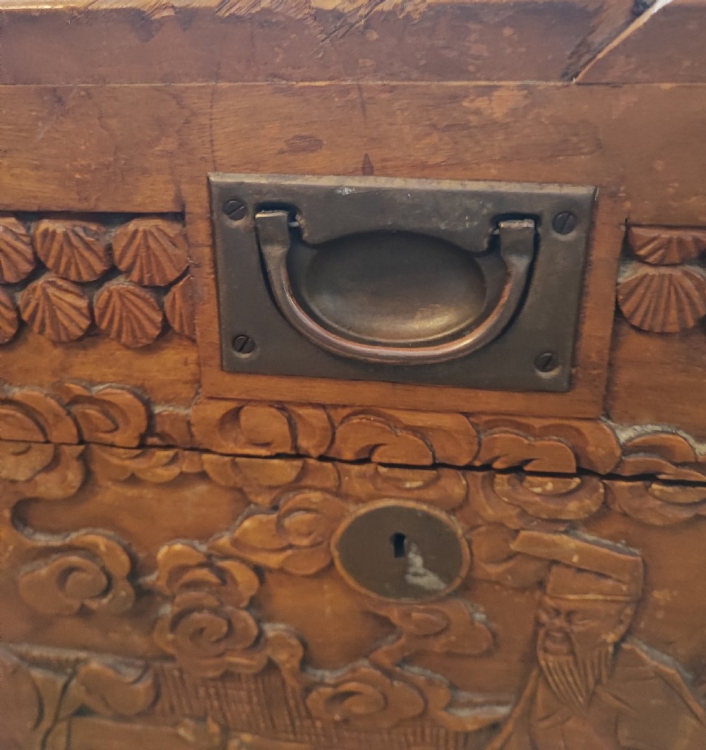 An antique brass bound  chinese  carved camphor trunk  View V