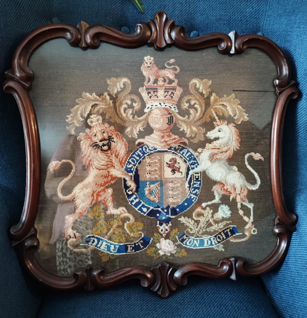A Victorian Berlin woolwork featuring the royal military coat of arms.  View VI