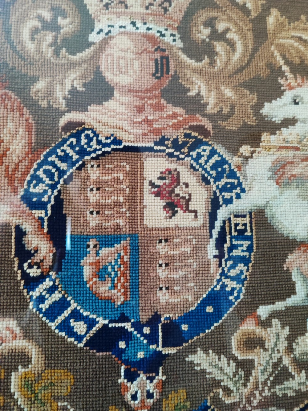 A Victorian Berlin woolwork featuring the royal military coat of arms.  View VII