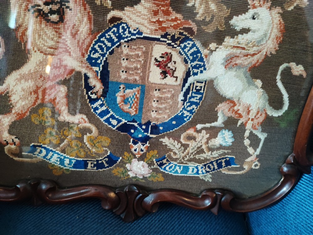 A Victorian Berlin woolwork featuring the royal military coat of arms.  View IX