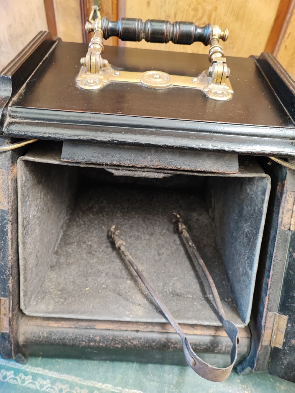 Esthetic movement ebonized and brass panelling ( patent) coalbox. View VI