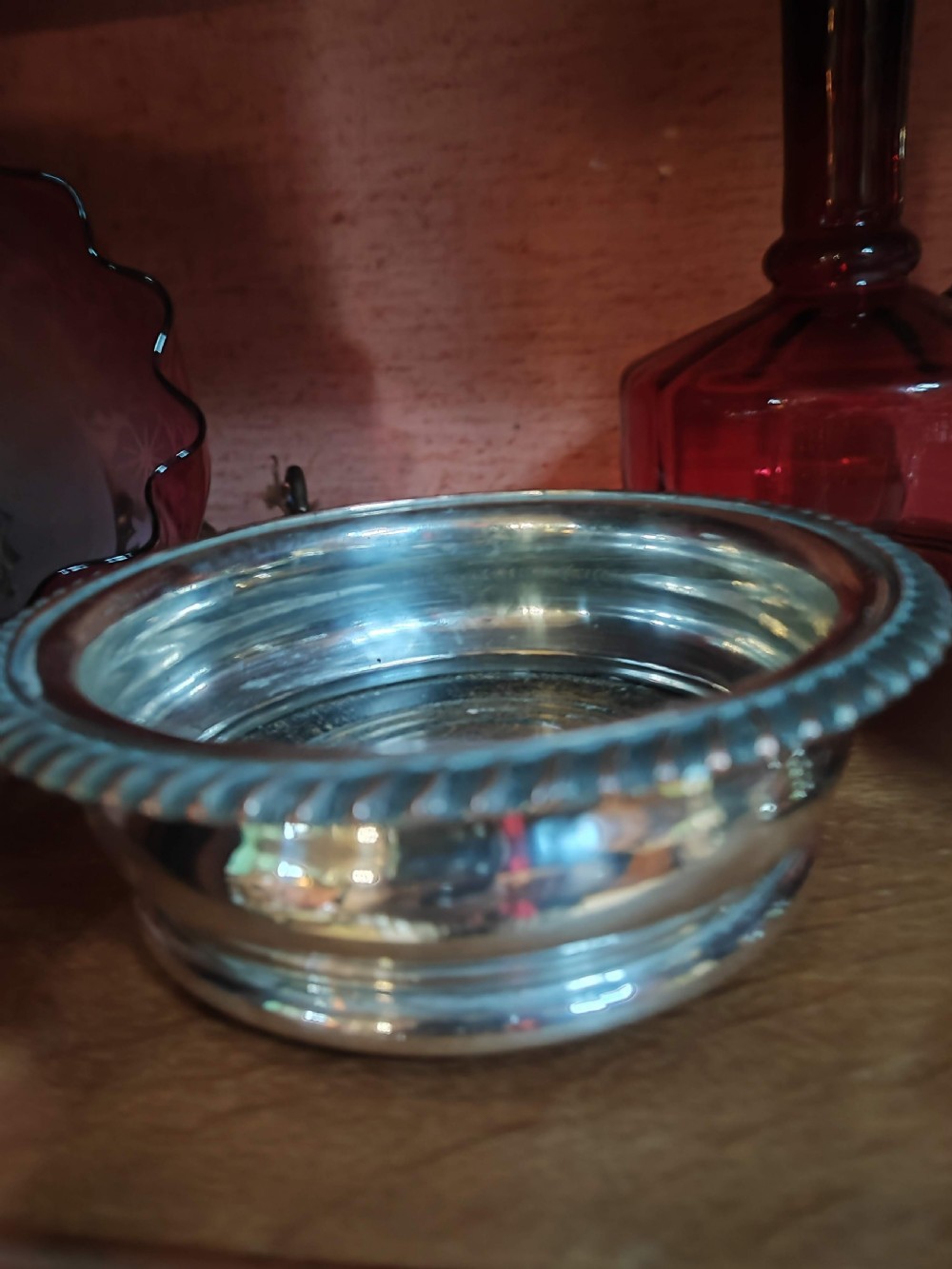 A pair of Sheffield plate bottle coasters.  View II