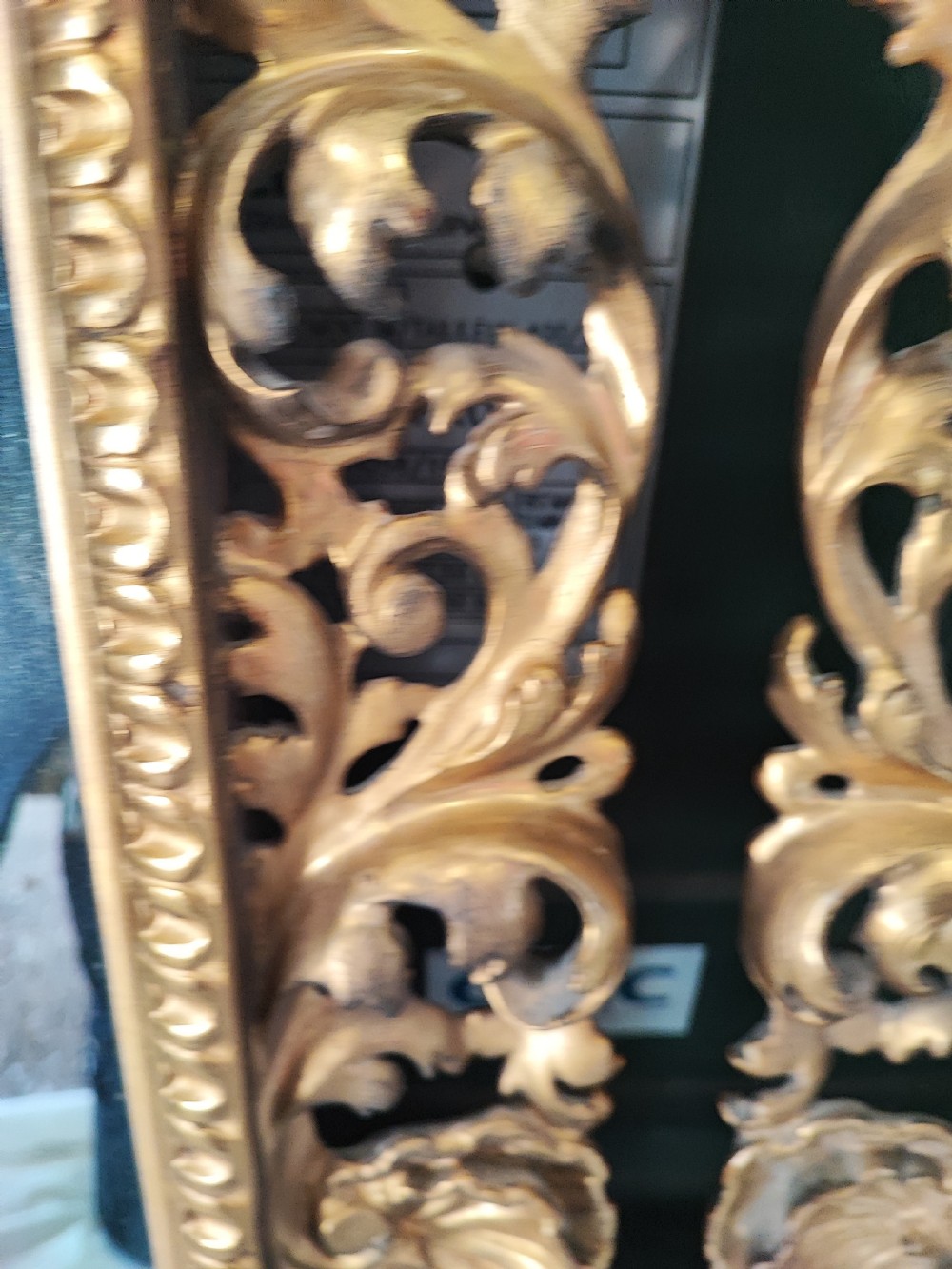 A pair of 19c carved gilt wood Italian Florentine mirrors. View IV