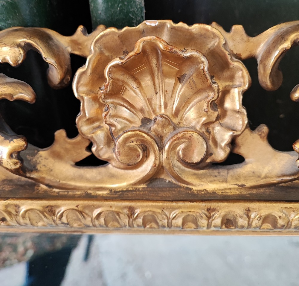 A pair of 19c carved gilt wood Italian Florentine mirrors. View VI