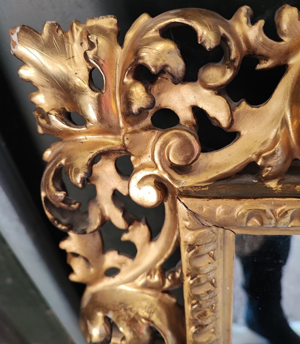 A pair of 19c carved gilt wood Italian Florentine mirrors. View VII