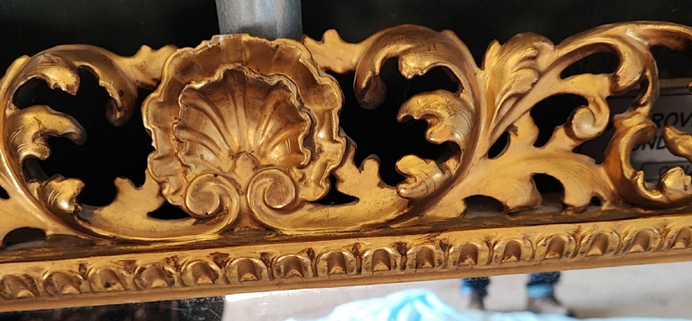 A pair of 19c carved gilt wood Italian Florentine mirrors. View VIII