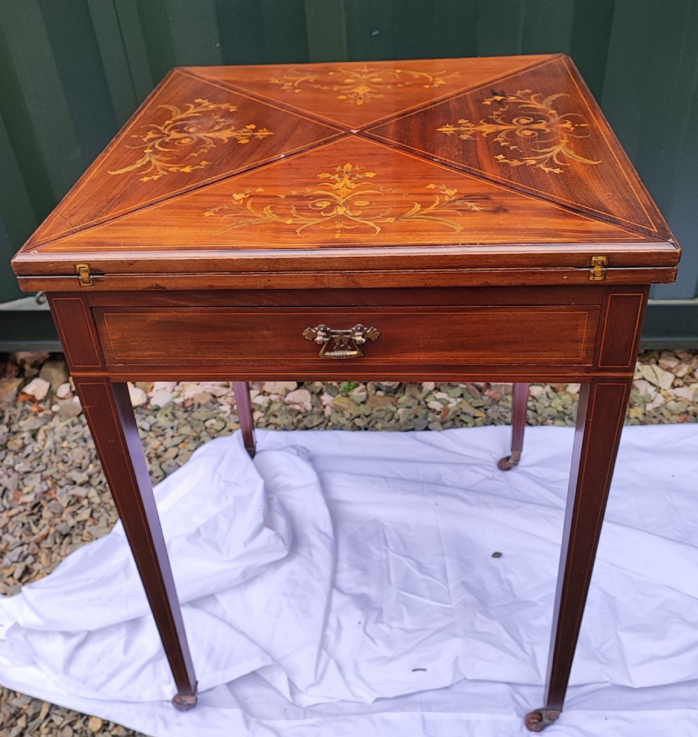 Quality marquetry inland mahogany envelope card table.