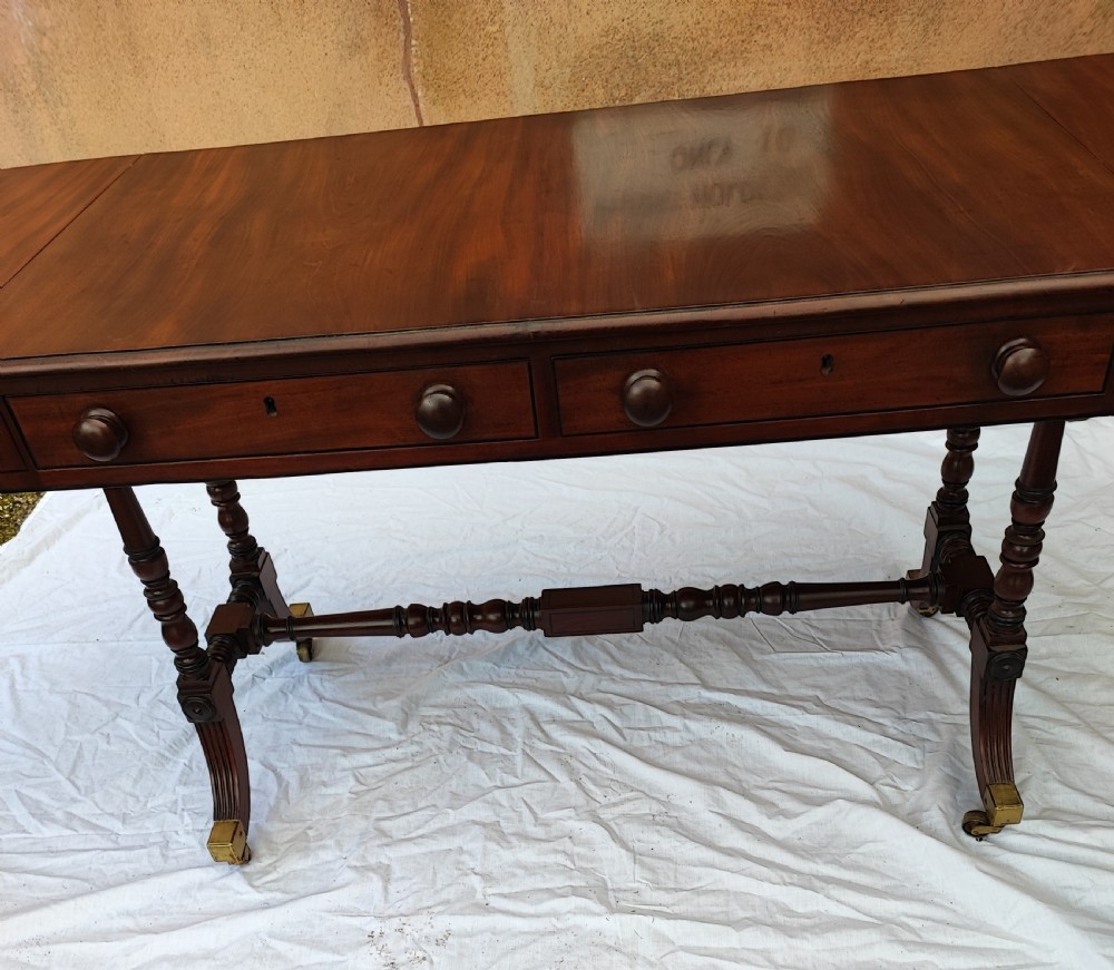 Regency mahogany and ebony sofa table. View X