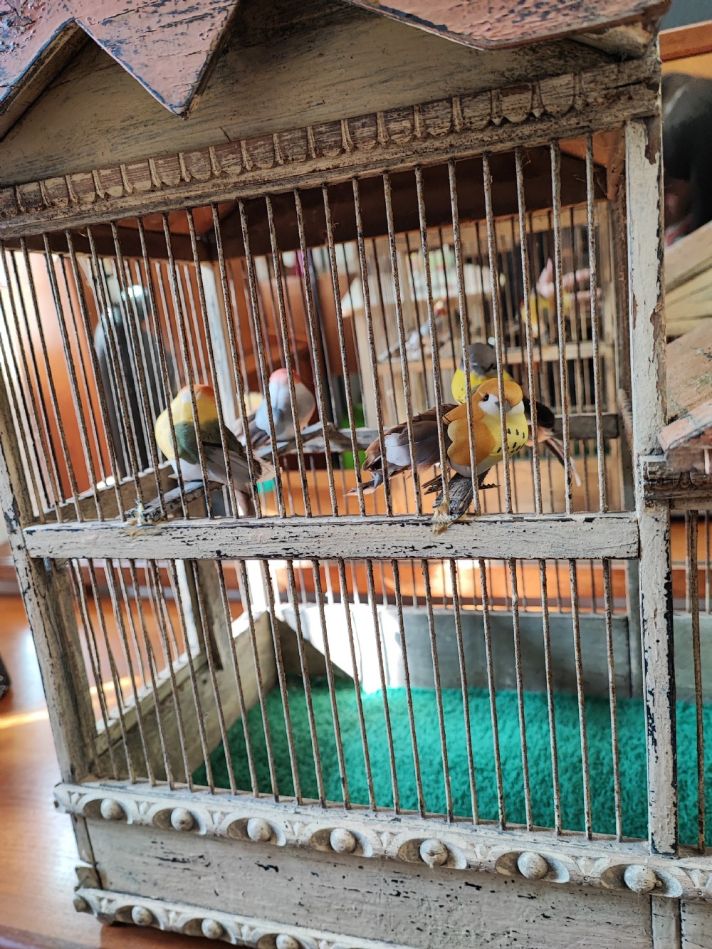An antique folk art pavilion bird cage. View XV