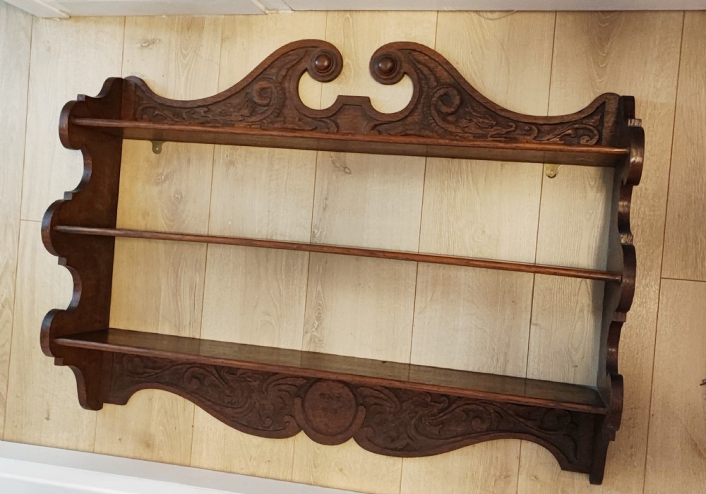 Antique carved oak hanging wall shelves
