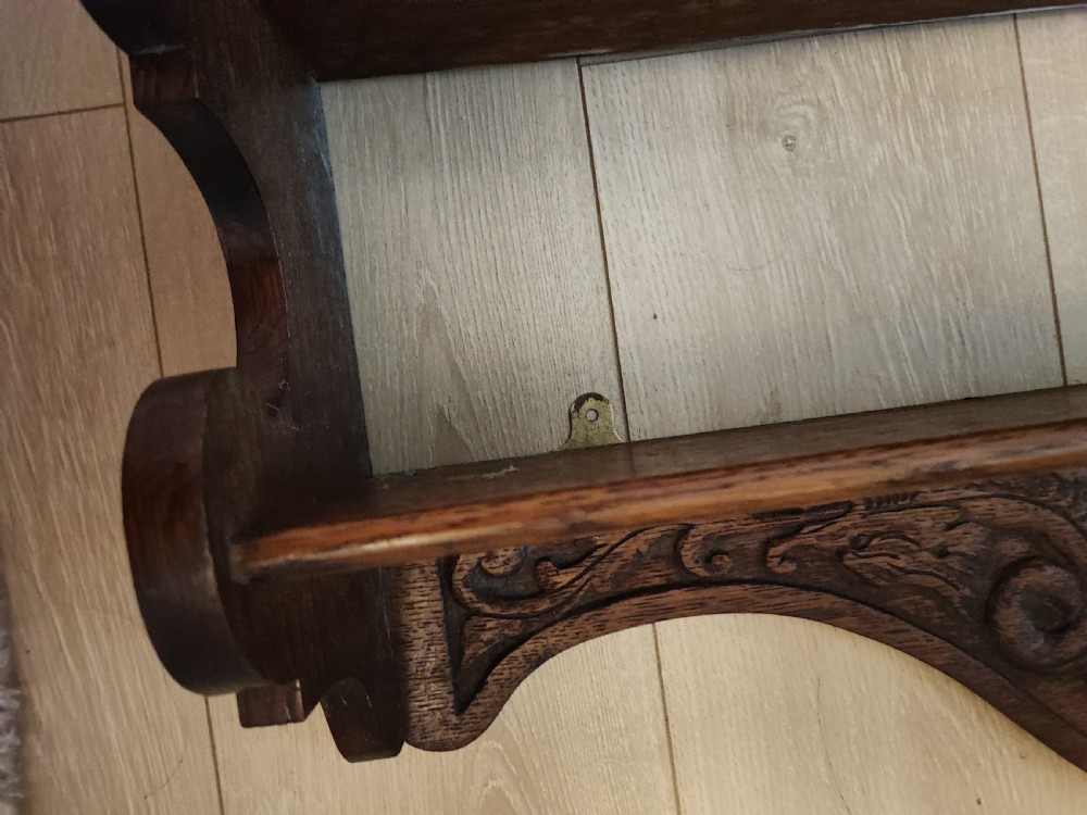 Antique carved oak hanging wall shelves View XII