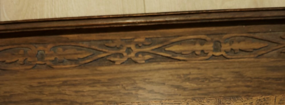 Art's and crafts oak table bookshelf with a collection of 28 classic novels. View III