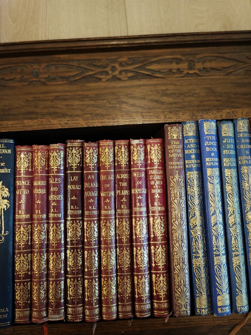 Art's and crafts oak table bookshelf with a collection of 28 classic novels. View IV