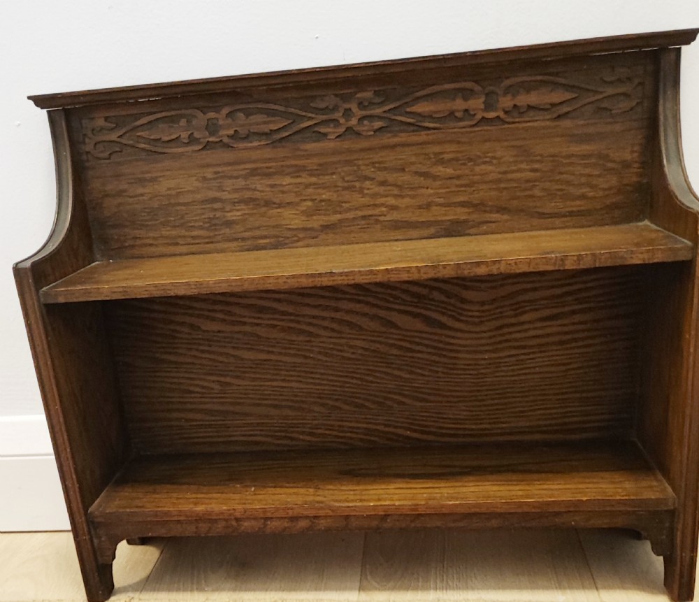 Art's and crafts oak table bookshelf with a collection of 28 classic novels. View XIII