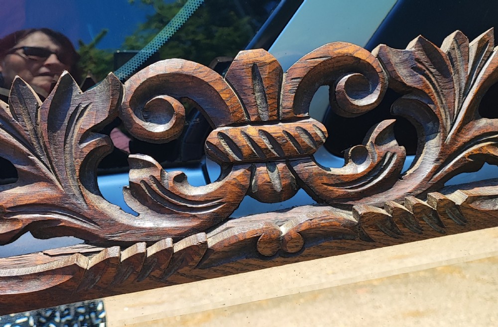 Antique large and impressive french  carved cushioned oak framed mirror. View IX