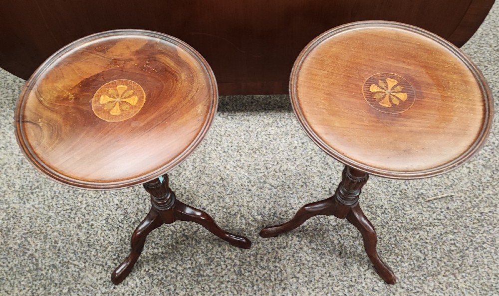 A pair of Edwardian inlaid wine tables 
