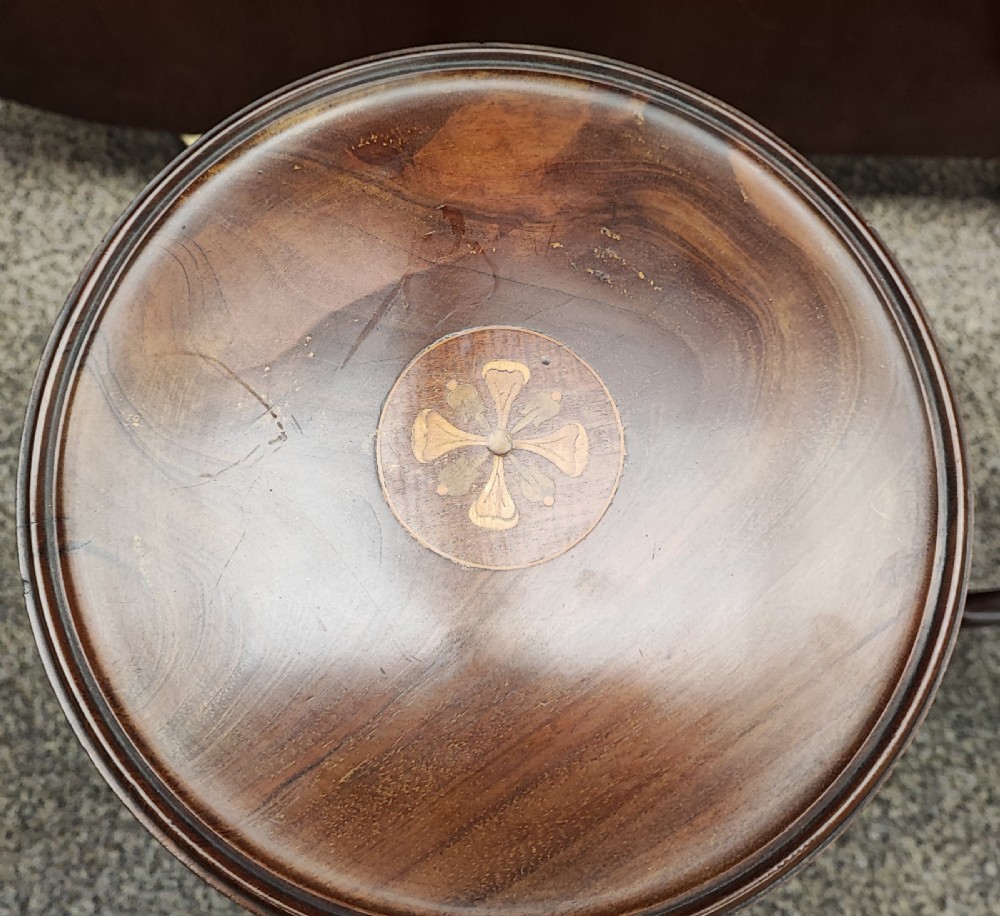 A pair of Edwardian inlaid wine tables  View II