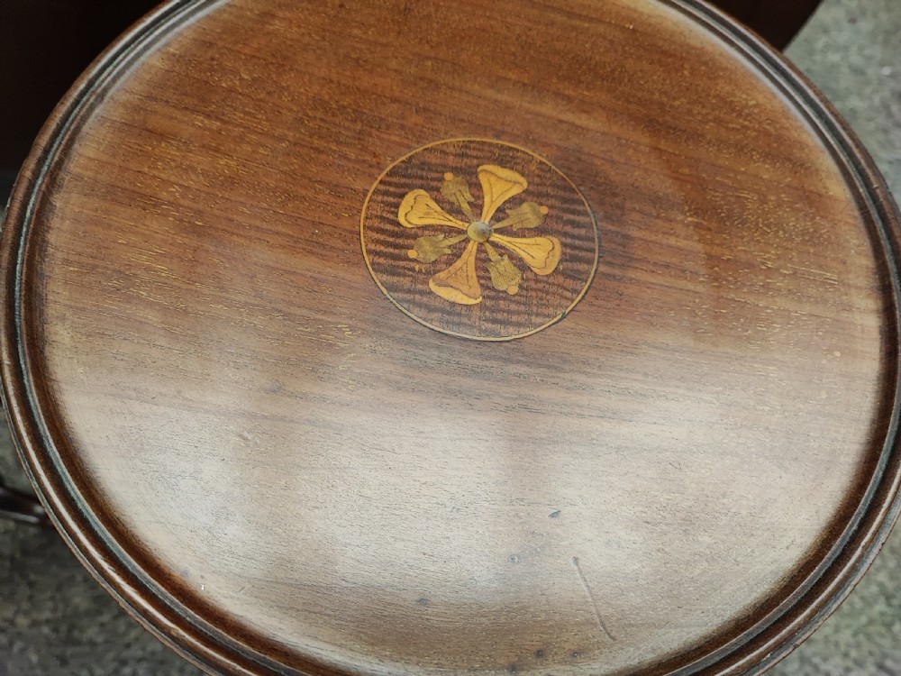 A pair of Edwardian inlaid wine tables  View IV