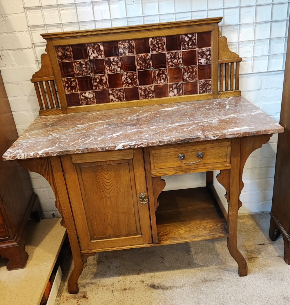 Art's and crafts ash marble top washstand.