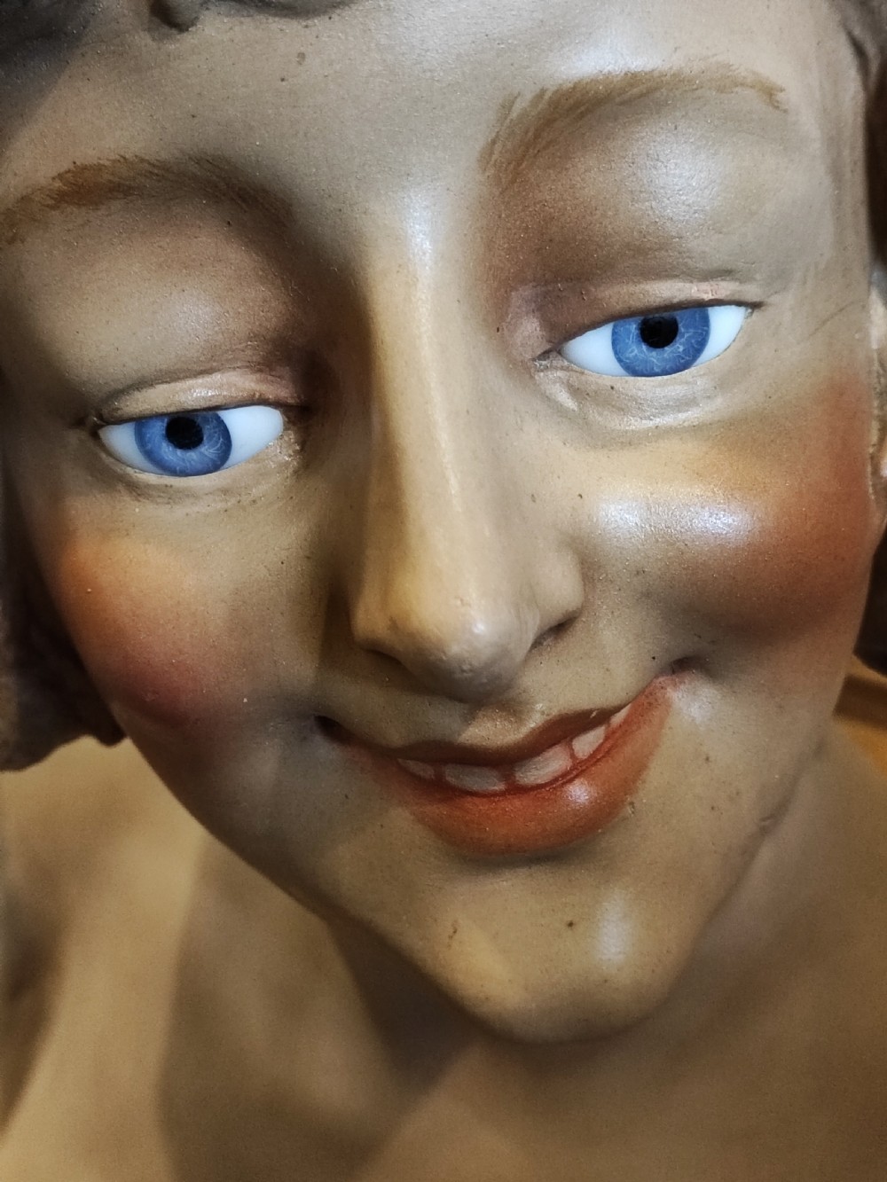 An antique French painted terracotta bust with glass eyes  View V