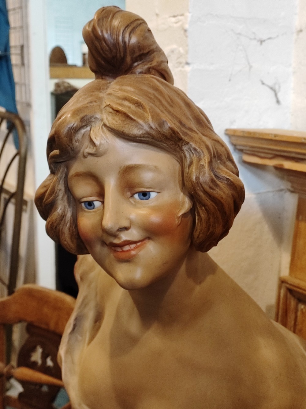 An antique French painted terracotta bust with glass eyes  View VI
