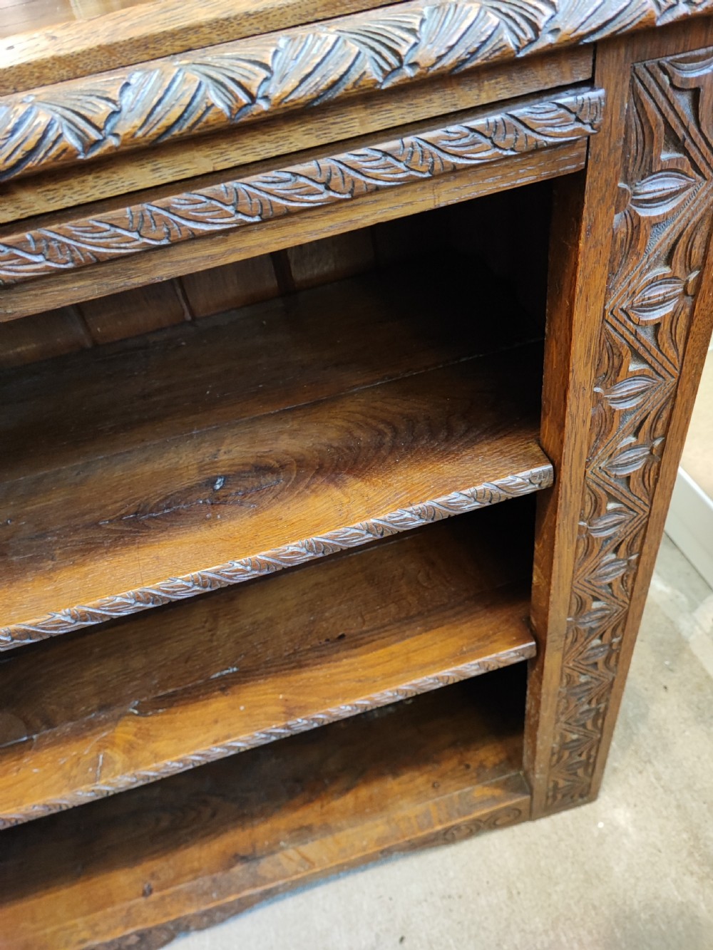 19c carved oak open bookcase. View VI
