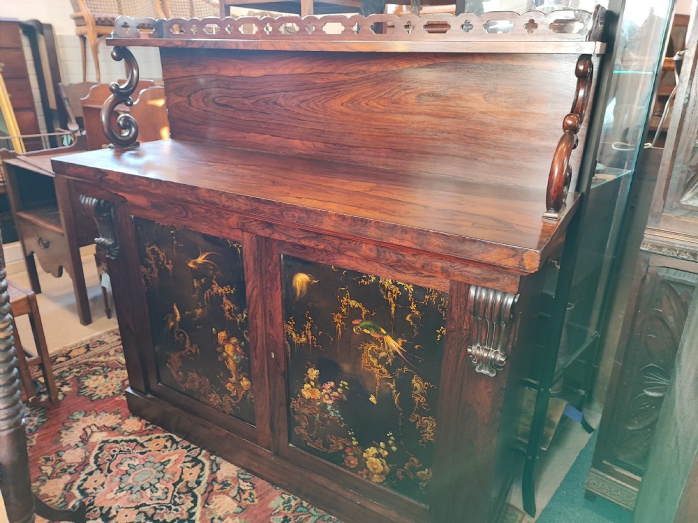 A fine Regency rosewood and paper mache side cabinet.