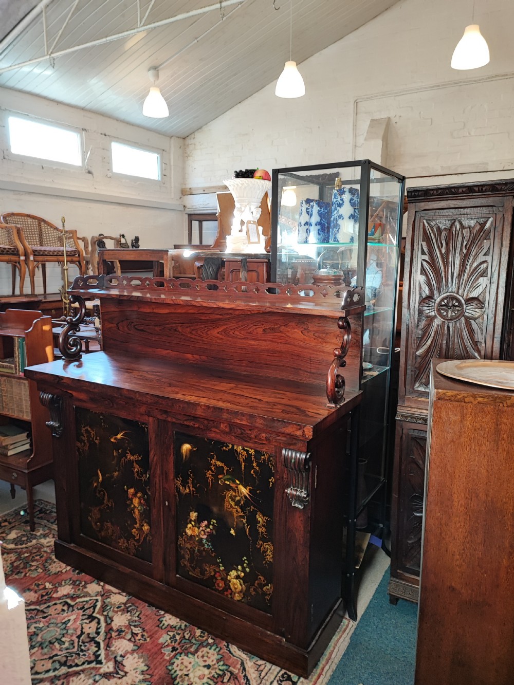 A fine Regency rosewood and paper mache side cabinet. View V