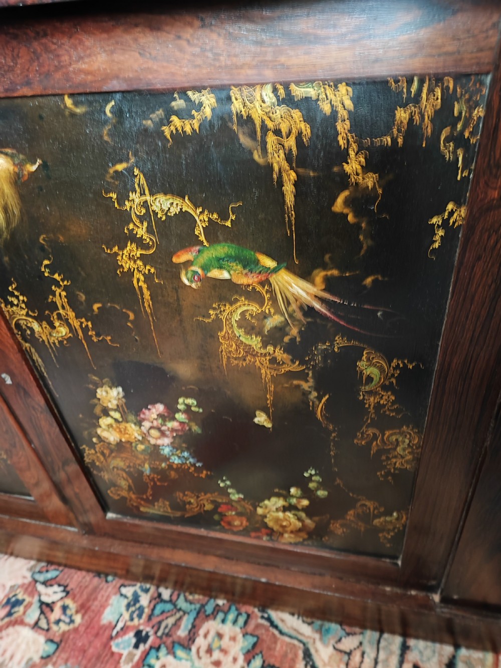 A fine Regency rosewood and paper mache side cabinet. View VIII