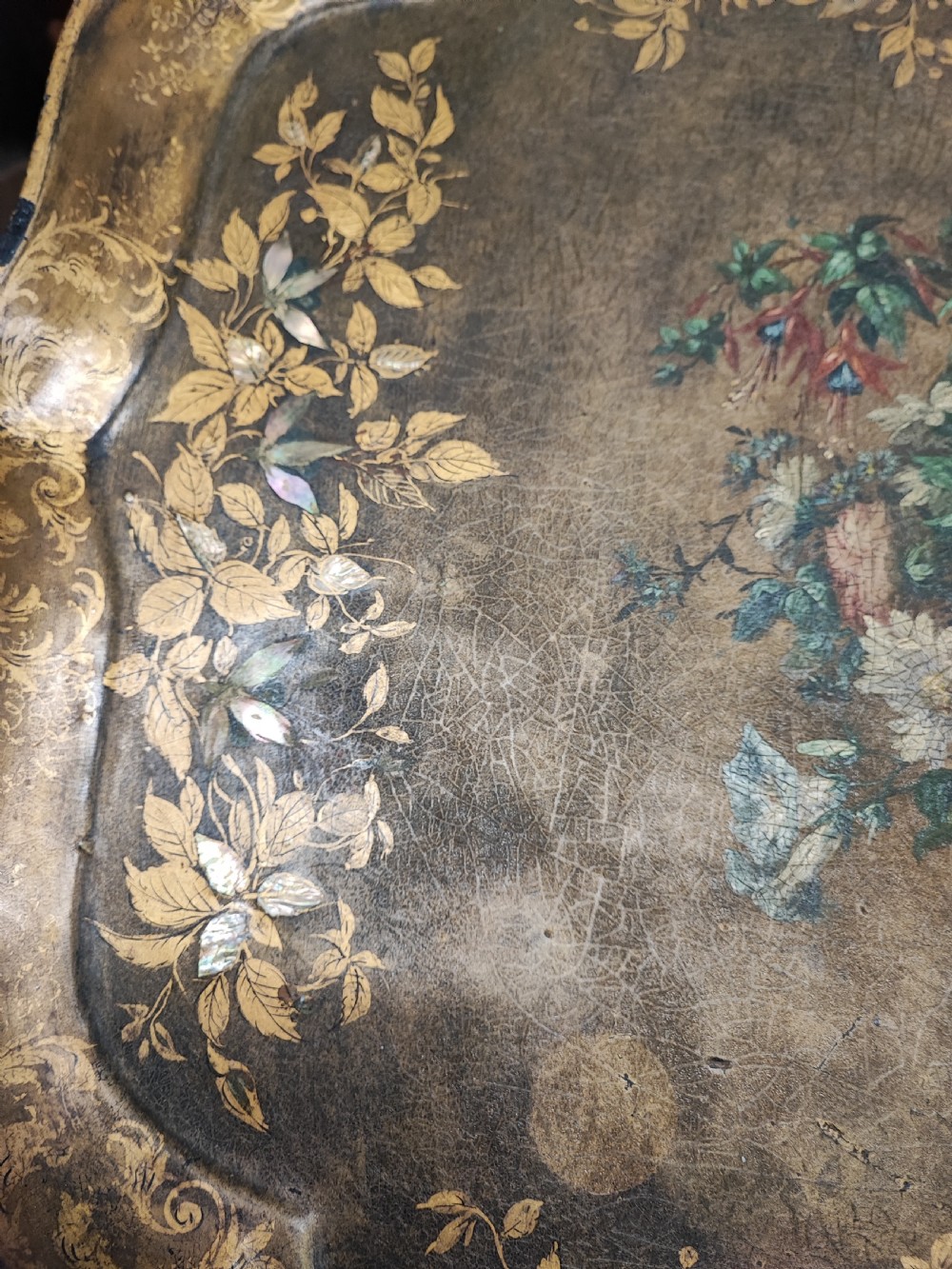 A large Regency gold lacquer and mother of pearl inlaid paper mache tray View V