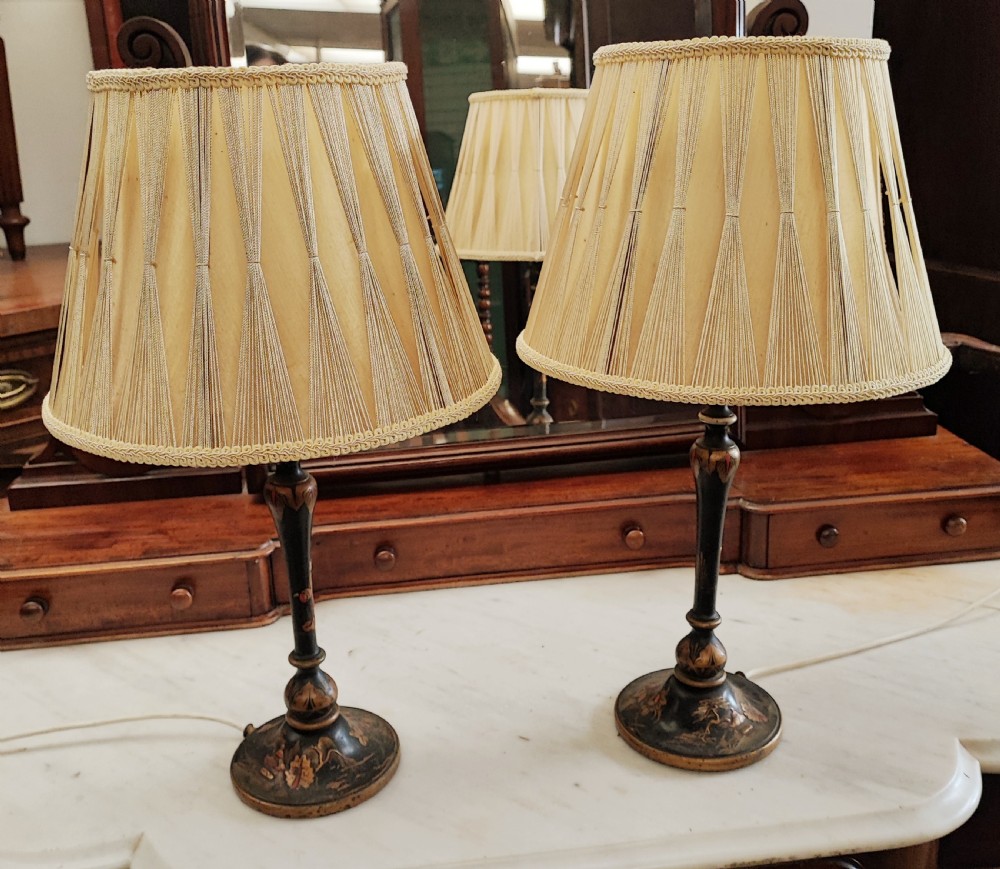 Pair of antique Chinoiserie lacquered table lamps.