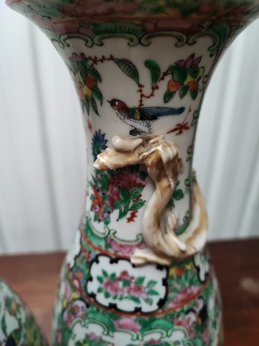 An antique pair of chinese  Famille Rose vases. View III
