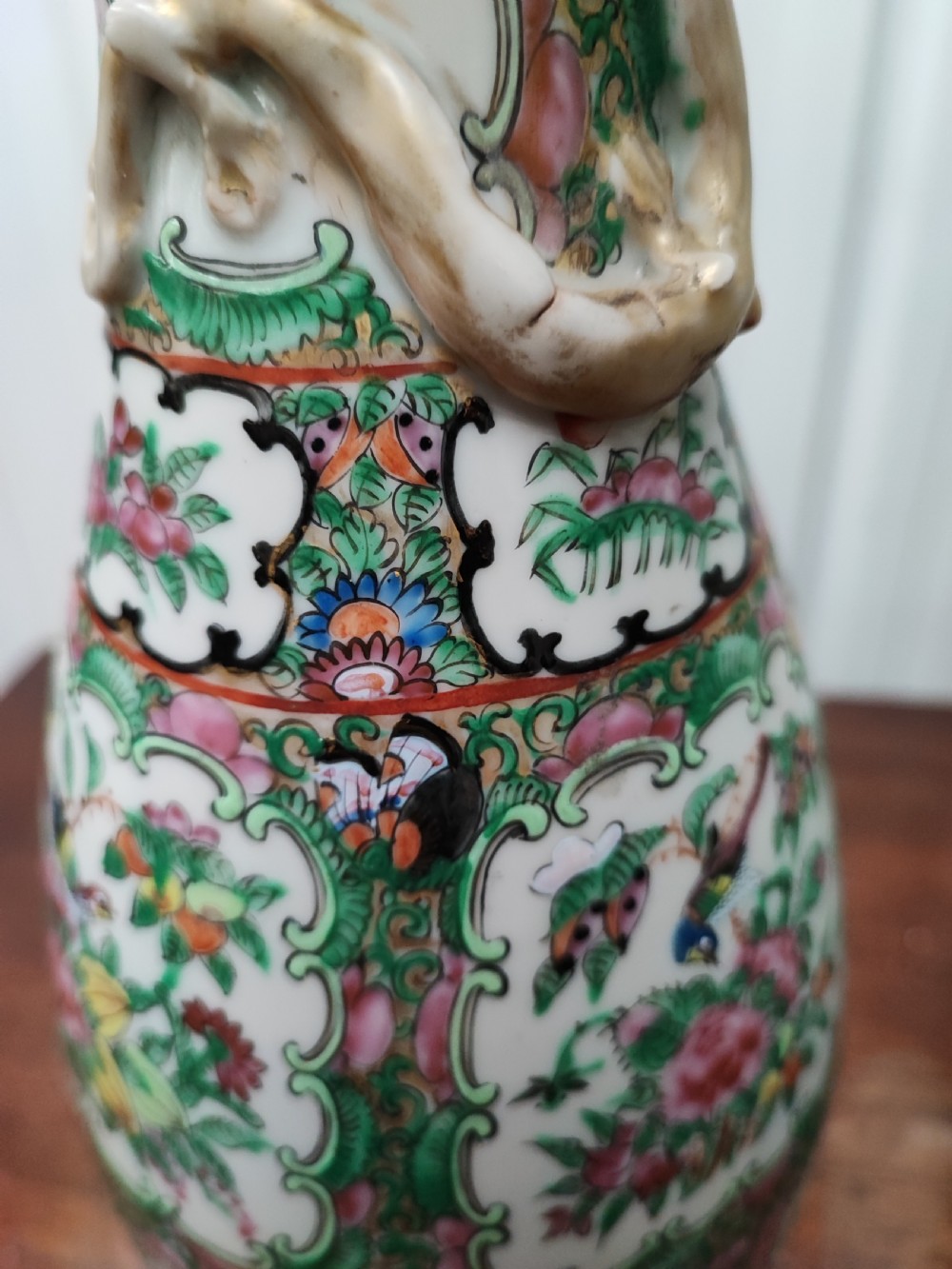 An antique pair of chinese  Famille Rose vases. View IV
