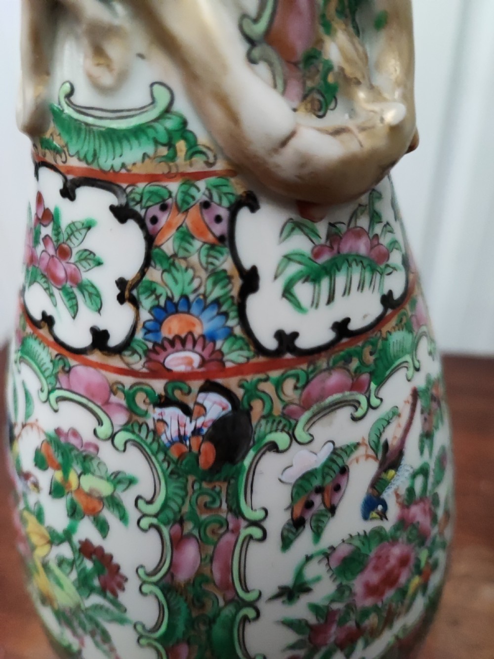 An antique pair of chinese  Famille Rose vases. View V