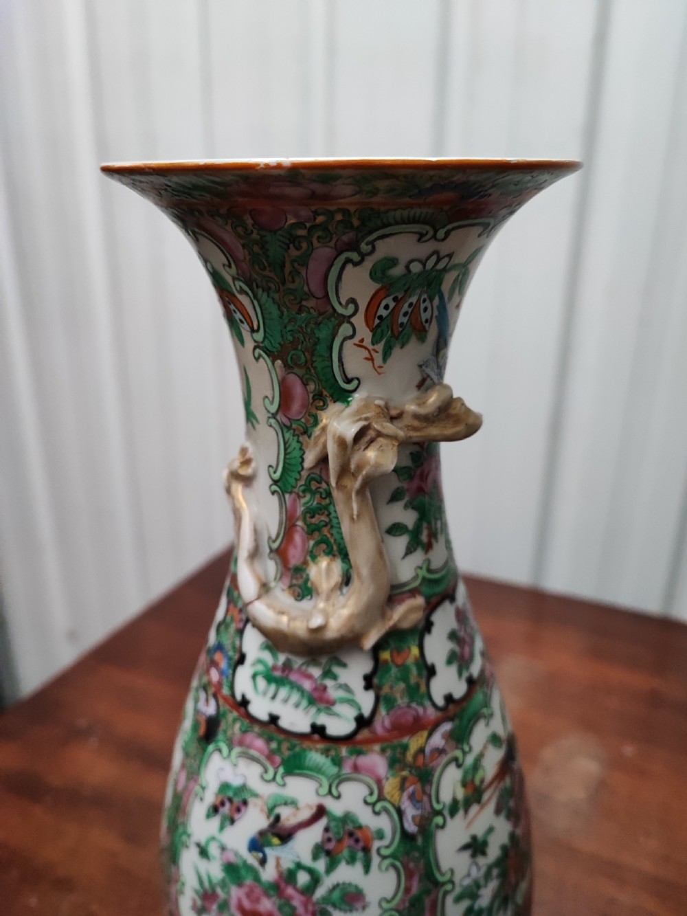 An antique pair of chinese  Famille Rose vases. View VII