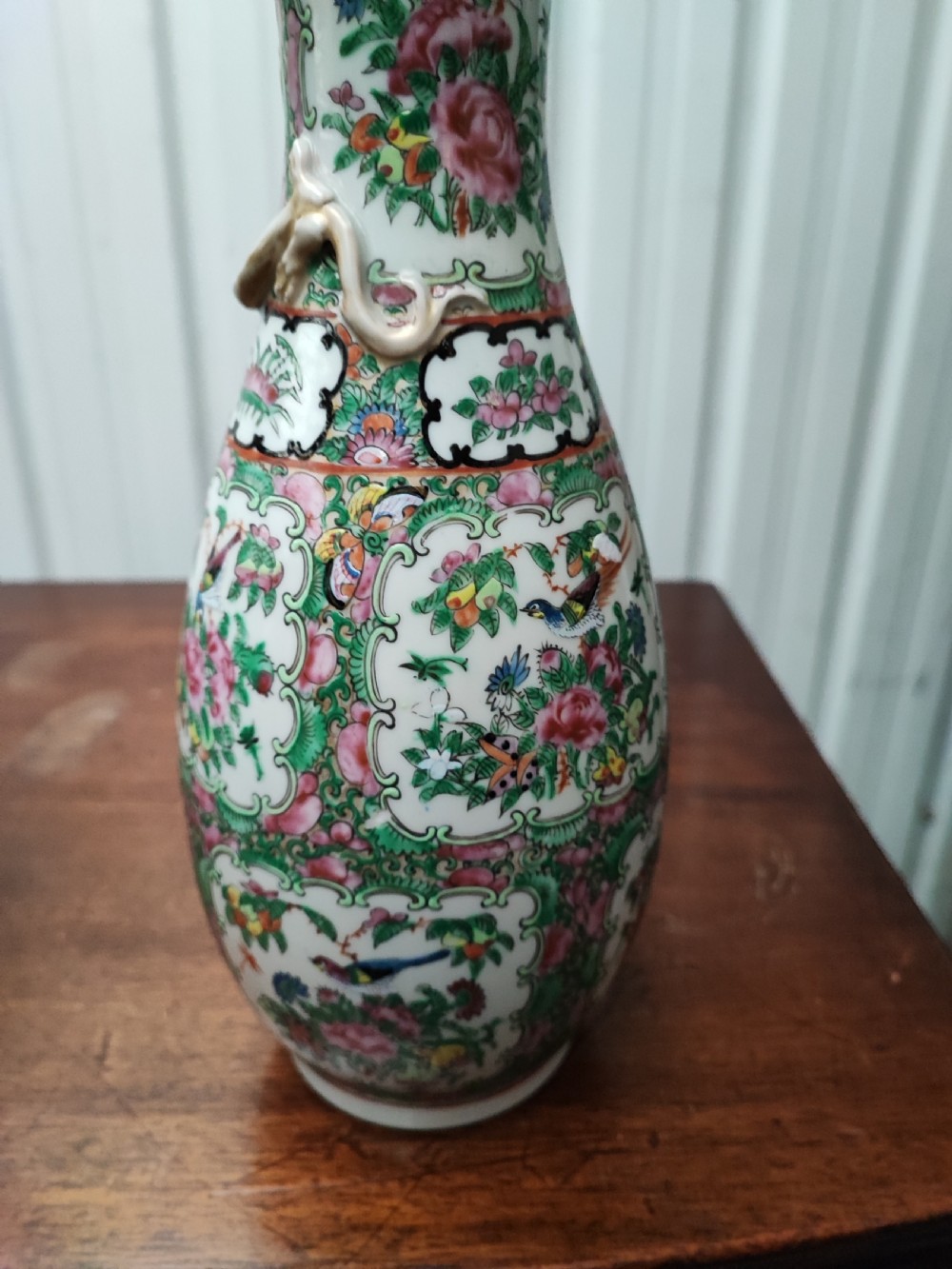 An antique pair of chinese  Famille Rose vases. View XVI