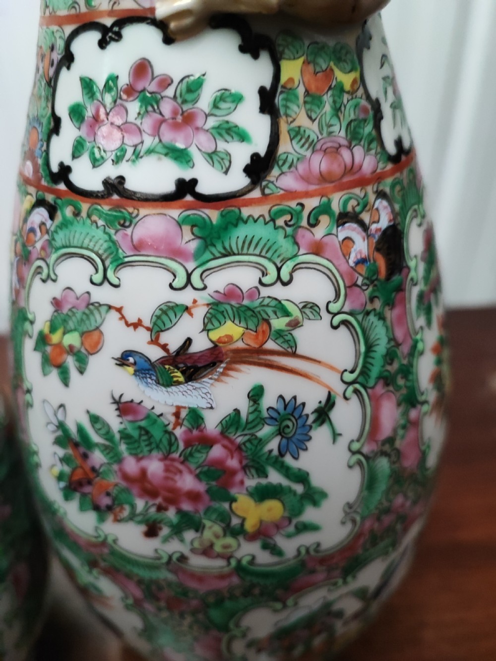 An antique pair of chinese  Famille Rose vases. View XVII