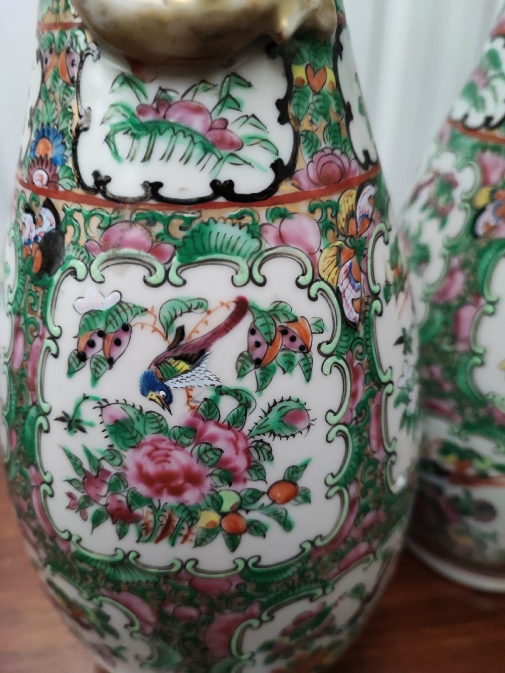 An antique pair of chinese  Famille Rose vases. View XVIII